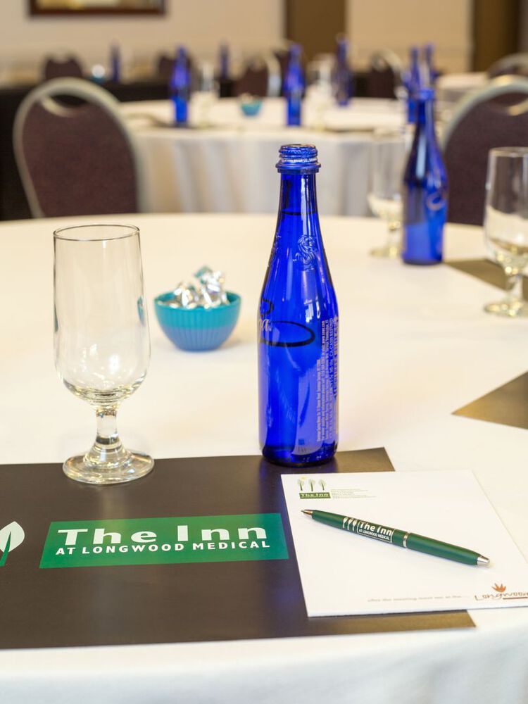 Closeup of a blue glass bottle on a table